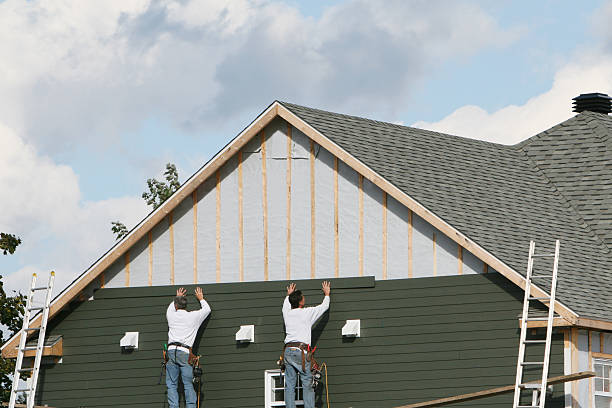 Professional Vinyl Siding technician working in Winfield, IL